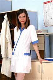 Sexy pouty brunette nurse with white stockings   Sexy pouty brunette nurse with white stockings