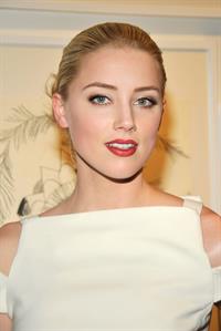 Amber Heard attends Tasya van Rees private viewing of Distorted Delicacies on June 22, 2011