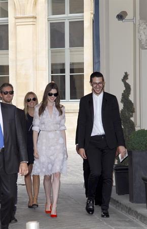 Anne Hathaway Givenchy private show for Anne Hathaway then visiting Chopard Jewelry in Paris on July 6, 2011