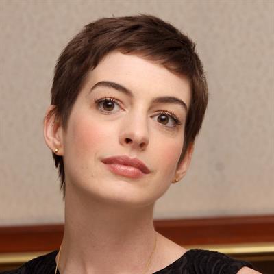 Anne Hathaway the Dark Knight Rises press conference portraits in Beverly Hills on July 8, 2012