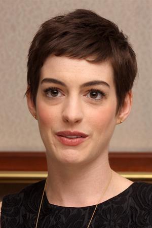 Anne Hathaway the Dark Knight Rises press conference portraits in Beverly Hills on July 8, 2012