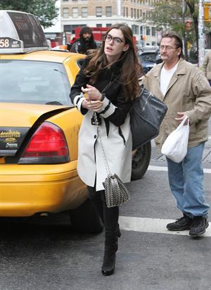 Anne Hathaway out in New York on October 26, 2011