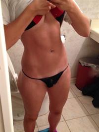 Anonymous in lingerie taking a selfie