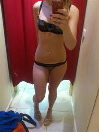 Anonymous in lingerie taking a selfie