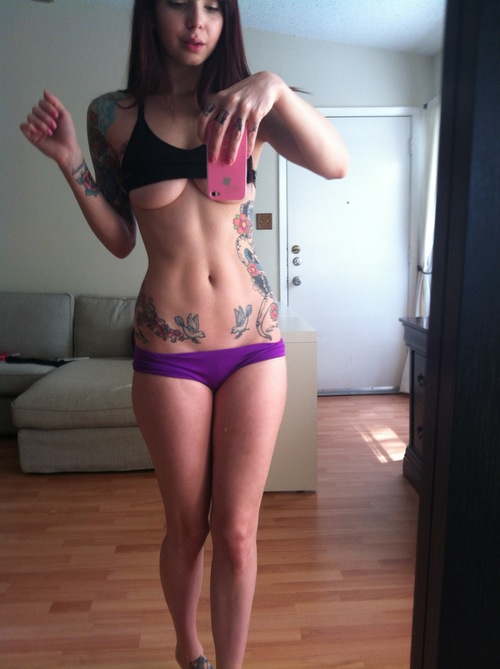 Anonymous in a bikini taking a selfie