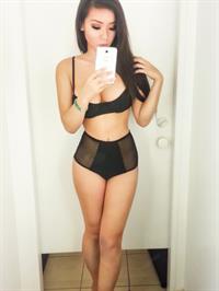 Anonymous in lingerie taking a selfie