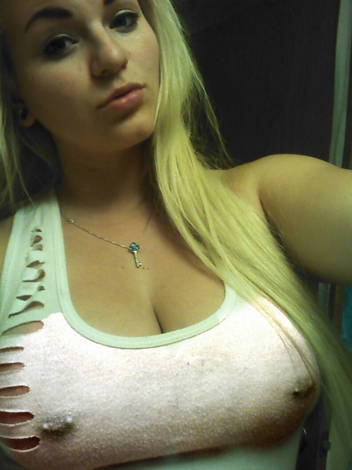 Anonymous taking a selfie and - breasts