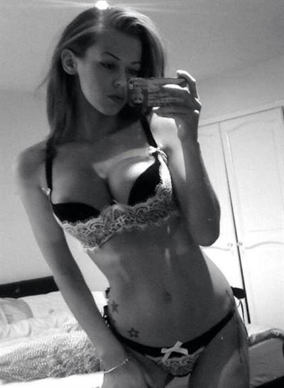 Anonymous in lingerie taking a selfie