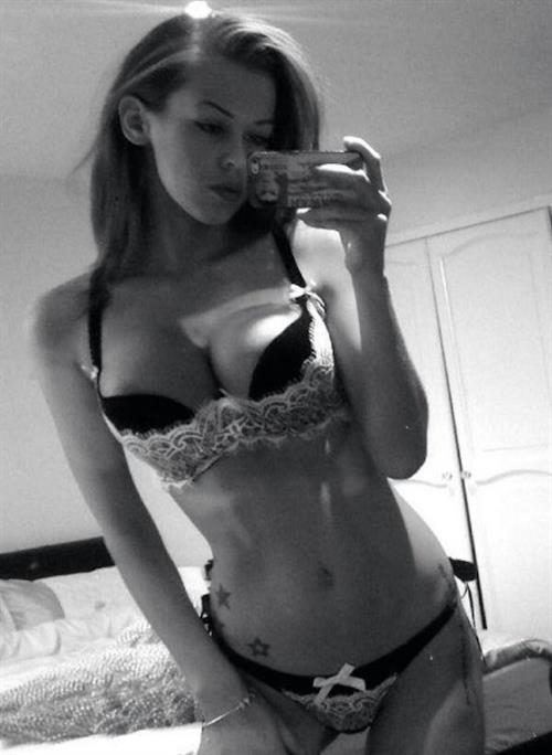 Anonymous in lingerie taking a selfie