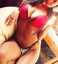 Anonymous in lingerie taking a selfie