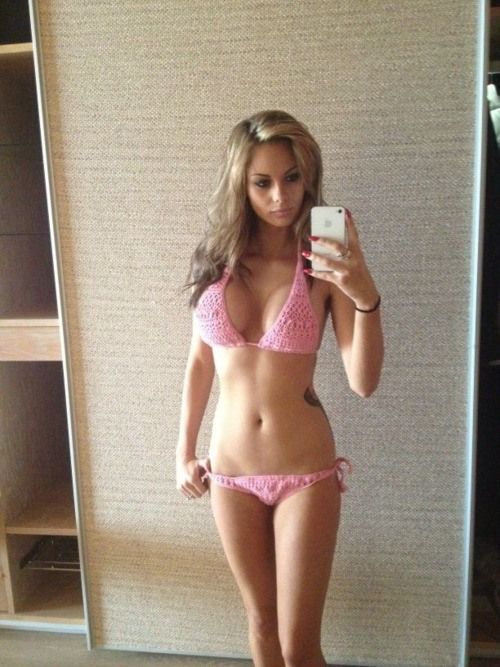Anonymous in a bikini taking a selfie