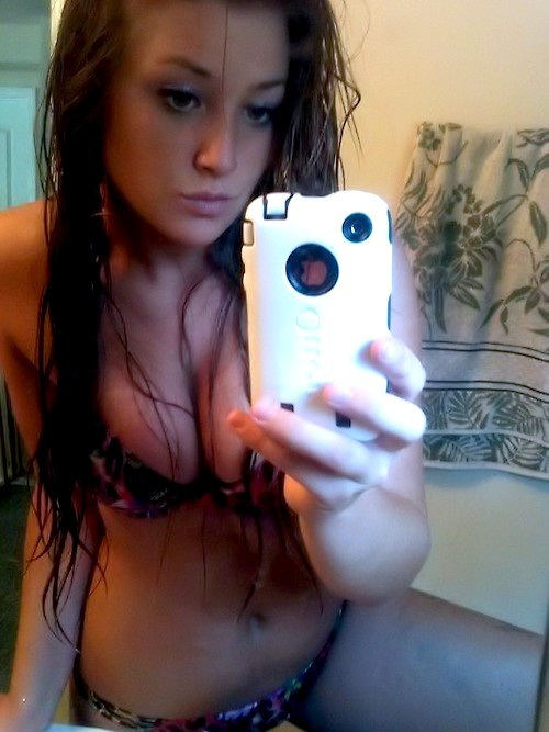 Anonymous in lingerie taking a selfie