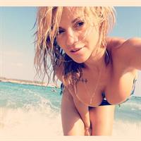 Anonymous in a bikini taking a selfie