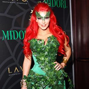 Kim Kardashian as Poison Ivy for the 2011 Midori Green Halloween party in New York