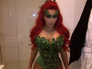 Kim Kardashian as Poison Ivy for the 2011 Midori Green Halloween party in New York