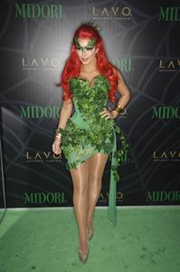 Kim Kardashian as Poison Ivy for the 2011 Midori Green Halloween party in New York