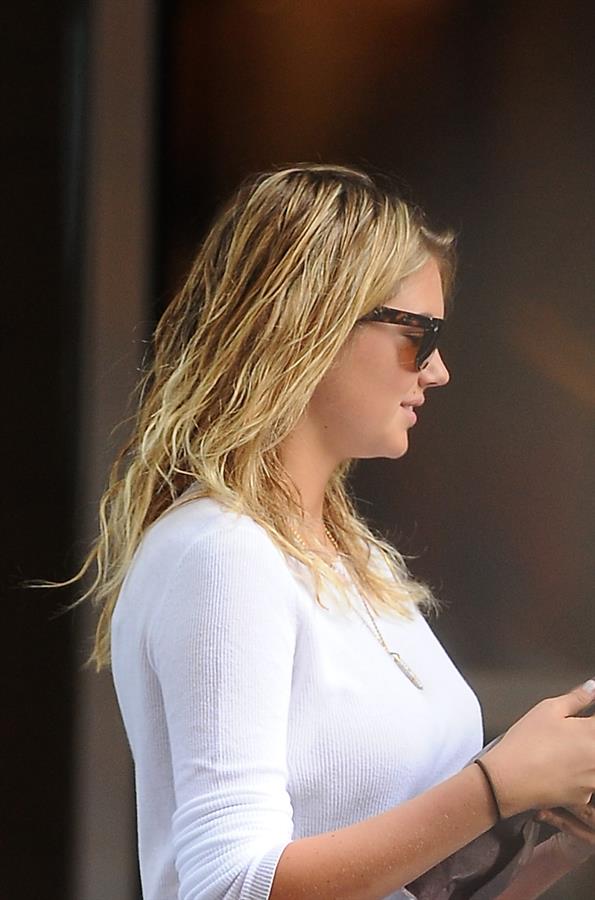 Kate Upton on her phone in New York City on June 21, 2013