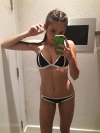 Anonymous in a bikini taking a selfie