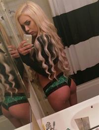 Anonymous in lingerie taking a selfie and - ass