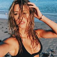 Cindy Prado in a bikini taking a selfie