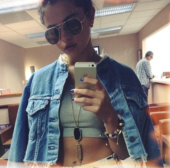 Selena Gomez taking a selfie