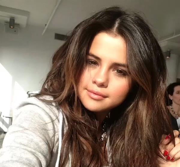 Selena Gomez taking a selfie