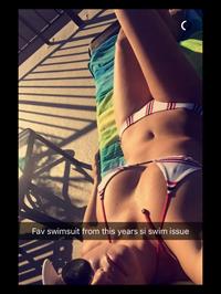 Genevieve Morton in a bikini taking a selfie