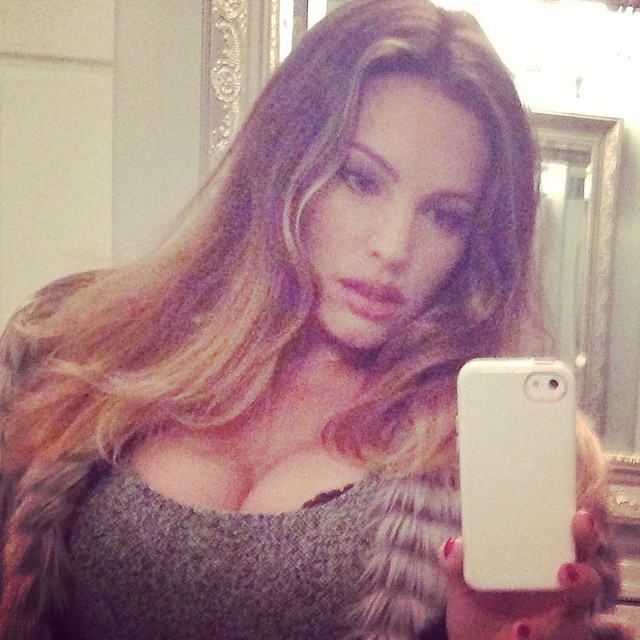 Kelly Brook taking a selfie