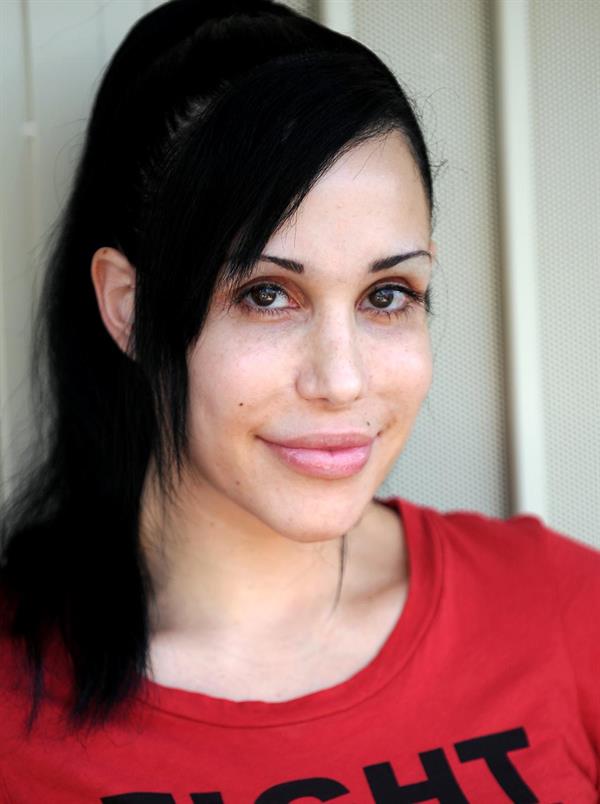 Nadya Suleman is better known as Octomom.  She was born Natalie Denise Suleman on July 11, 1975.  After 14 children she is stripping and making porn...