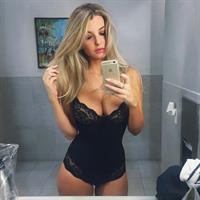 Emily Sears in lingerie taking a selfie