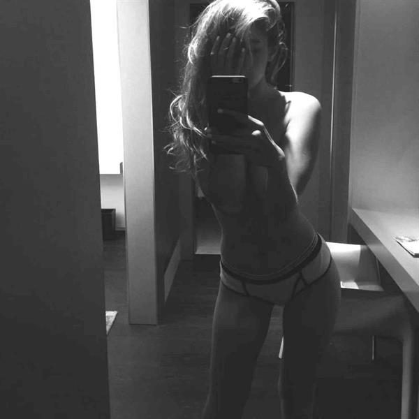 Gigi Hadid in lingerie taking a selfie
