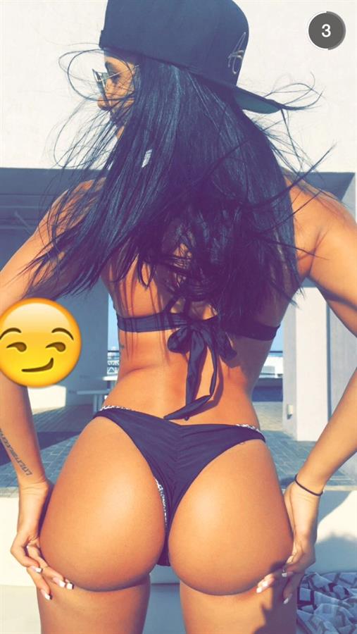 Katya Elise Henry in a bikini - ass