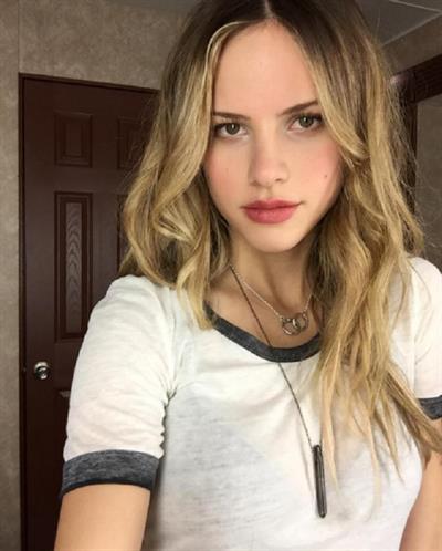Halston Sage taking a selfie