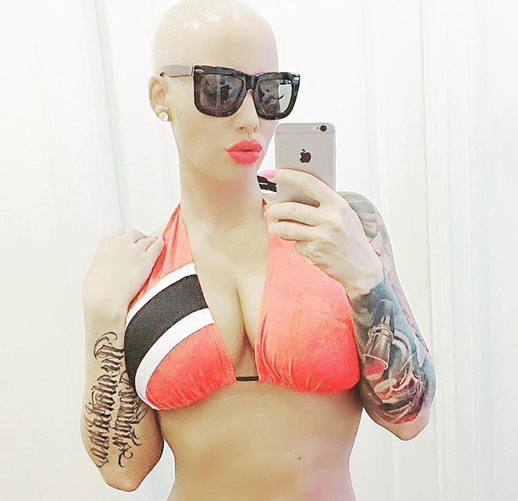 Amber Rose in a bikini taking a selfie