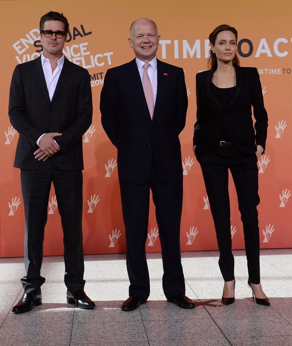 Angelina Jolie and Brad Pitt attend End Sexual Violence in Conflict Summit in east London, June 12, 2014