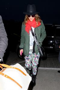 Jessica Alba arrives for an early morning flight at LAX, June 10, 2014