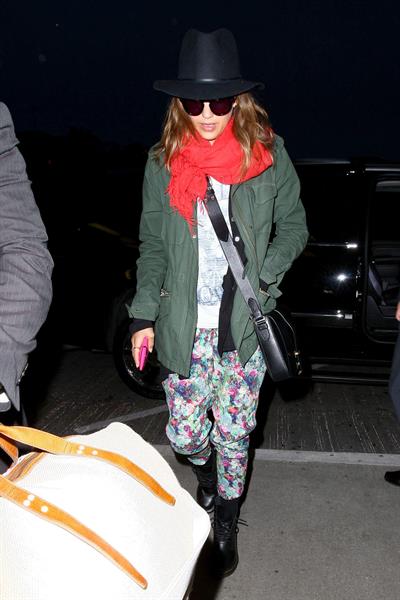 Jessica Alba arrives for an early morning flight at LAX, June 10, 2014