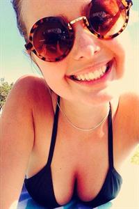 Anonymous in a bikini taking a selfie