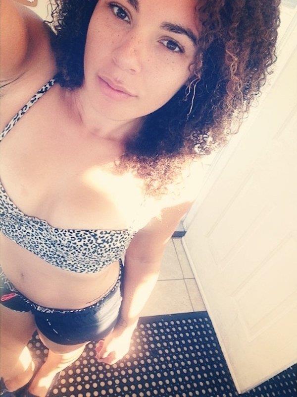 Anonymous in a bikini taking a selfie