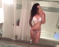 Anonymous in lingerie taking a selfie