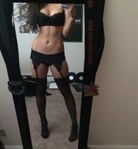 Anonymous in lingerie taking a selfie