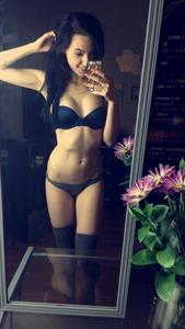 Anonymous in lingerie taking a selfie