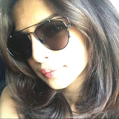 Priyanka Chopra taking a selfie
