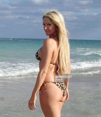 Erika Jayne in a bikini - ass