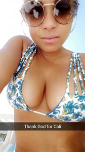 Christina Milian in a bikini taking a selfie