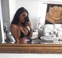 Anonymous in a bikini taking a selfie