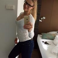 Adrienne Koleszár taking a selfie