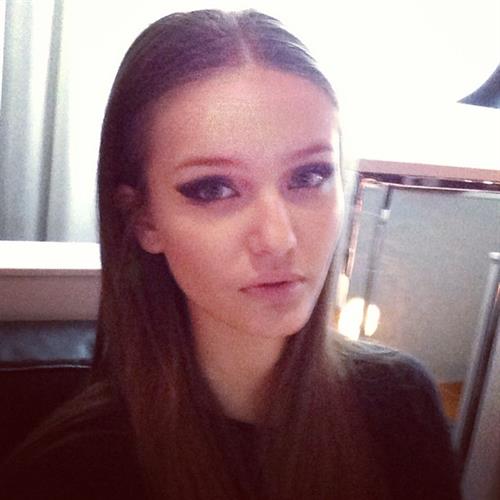 Kristina Romanova taking a selfie