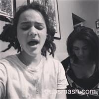 Sasha Lane taking a selfie
