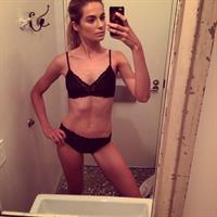 Bridget Malcolm in lingerie taking a selfie